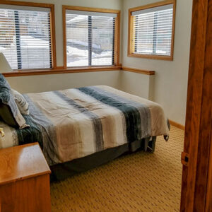 XL Condo A17 - Downstairs First Bedroom | Alpenglow Vacation Rentals Ouray