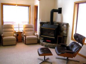 Condo A08 - Sitting Area By Stove | Alpenglow Vacation Rentals Ouray