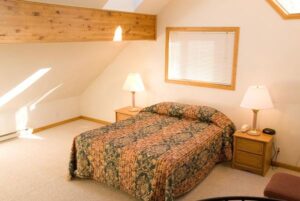 Condo A15 - Bedroom With Queen Bed And Nightstands | Alpenglow Vacation Rentals Ouray