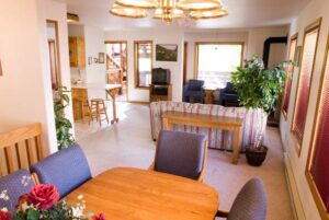 XL Condo A16 - Dining, Living Room, And Kitchen | Alpenglow Vacation Rentals Ouray
