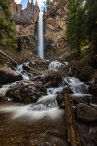 Beautiful waterfall deep in the mountains | Alpenglow Vacation Rentals Ouray